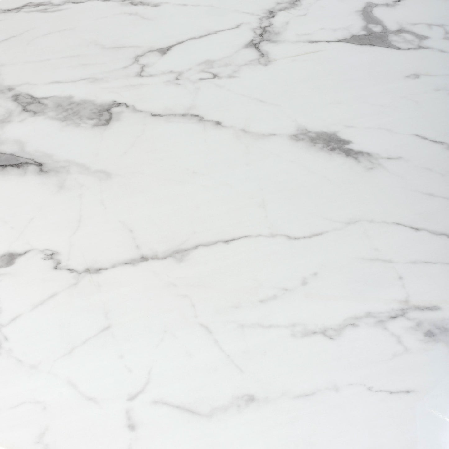 Raven Round Dining Table